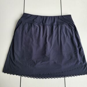 GREG NORMAN Women's Golf Skort Black Pull On Laser Cut Bow Tie Hem Pockets Sz M